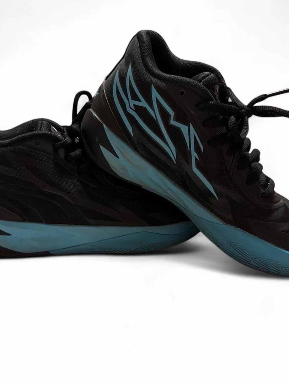 Puma Kids Black Sneakers with Blue Accents